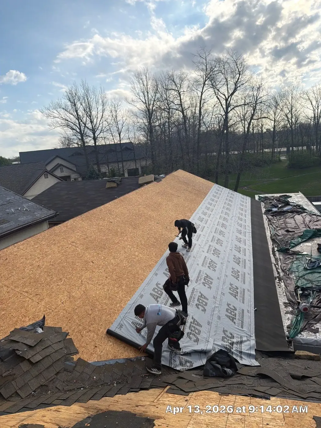 Tarping and dry-in on a Castleton commercial roof